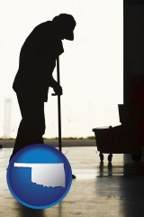 oklahoma map icon and a janitor silhouette