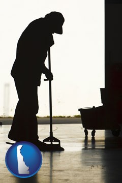 a janitor silhouette - with Delaware icon