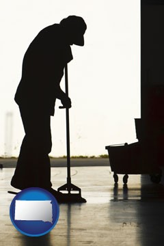 a janitor silhouette - with South Dakota icon